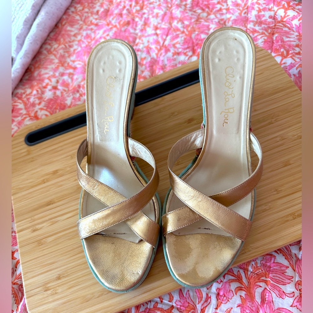 Beautiful wedge sandals. Leather straps. Wedge is covered in aqua shantung silk.